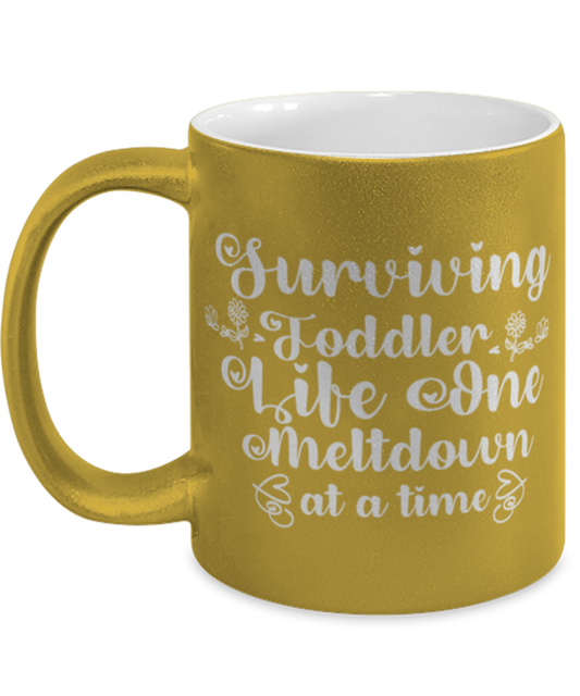Surviving Toddler Life One Meltdown at a time, gold Coffee Mug, Coffee Cup metallic 11oz. Model 60044